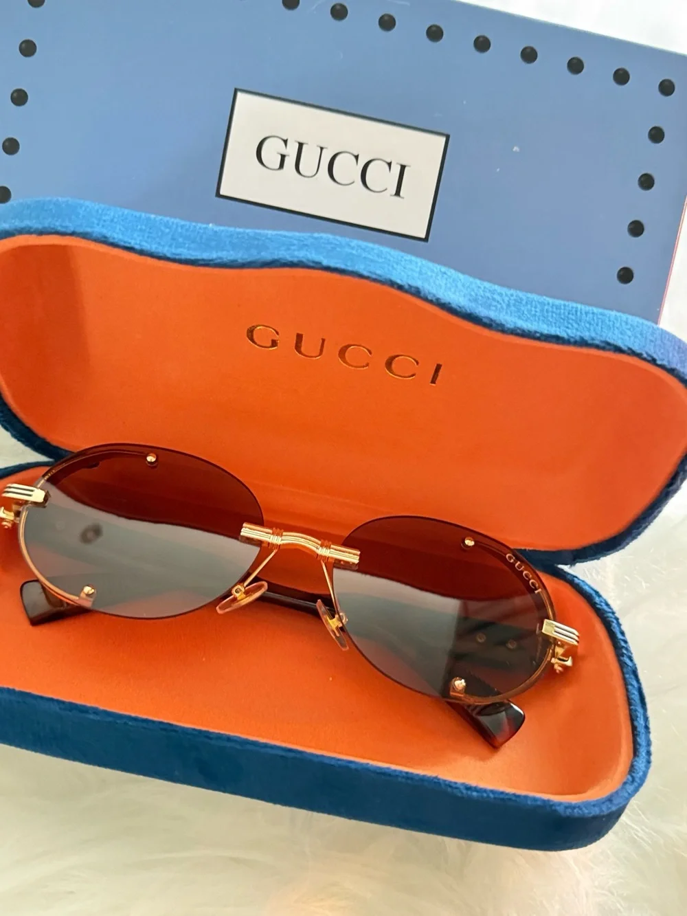 Gucci Round Rimless Sunglasses in Brown and Gold